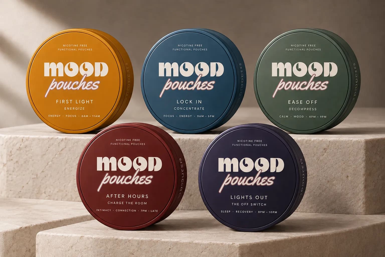 All five tins in day order on a stone plinth, in sunlight.